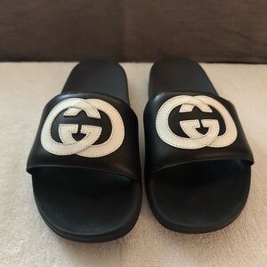 Gucci Black Slides with White Interlocking GG Logo